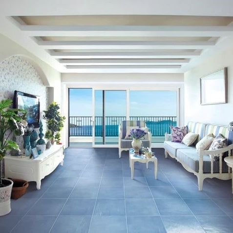 Salotto in stile mediterraneo. pavimento in gres porcellanato effetto cotto smaltato blu. serie cotto mediterraneo di savoia italia