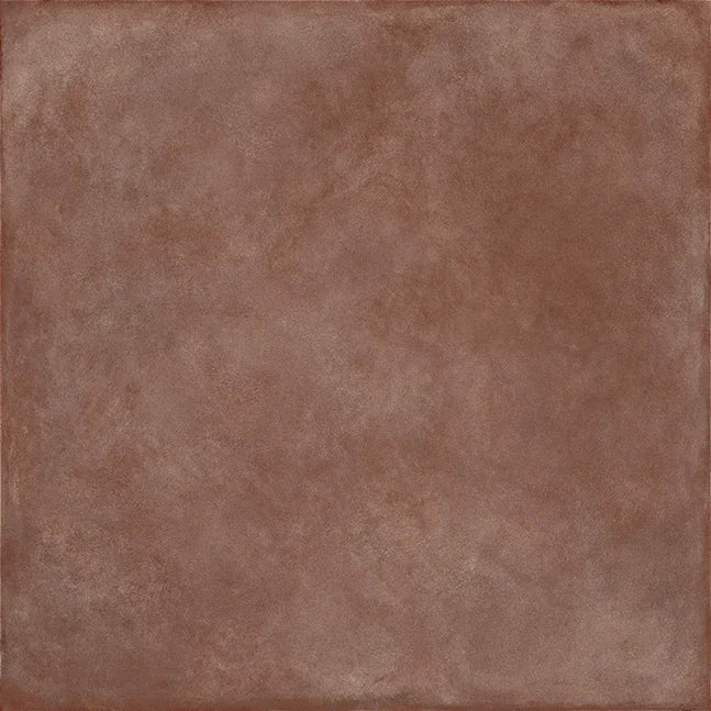 Dettaglio piastrella in gres porcellanato effetto cemento nuvolato della collezione Terrae di Casalgrande, formato 20x20 cm, colore Mattone