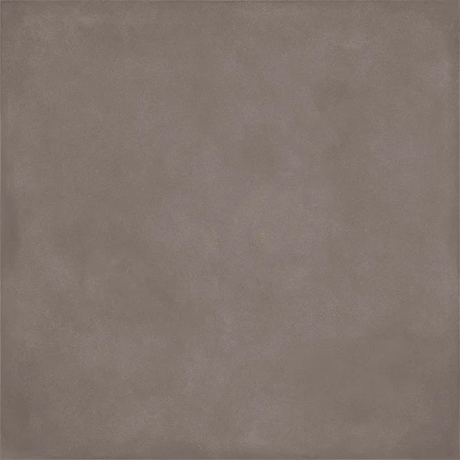 Dettaglio piastrella in gres porcellanato effetto cemento nuvolato della collezione Terrae di Casalgrande, formato 20x20 cm, colore Tabacco
