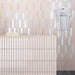 Piastrella rosa lucida olografica in ceramica per rivestimenti interni formato 5x25 colore Rose Hologram della collezione Spectre di 41zero42