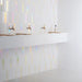 Piastrella bianca lucida olografica in ceramica per rivestimenti interni formato 5x25 colore Milk Hologram della collezione Spectre di 41zero42
