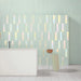 Piastrella azzurra lucida olografica in ceramica per rivestimenti interni formato 5x25 colore Sky Hologram della collezione Spectre di 41zero42