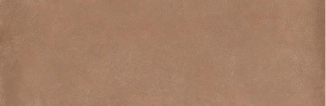 Dettaglio piastrella in gres porcellanato effetto cemento e effetto mattoncino della collezione Terrae di Casalgrande, formato 8x25 cm, colore Caramel