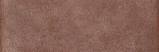 Dettaglio piastrella in gres porcellanato effetto cemento e effetto mattoncino della collezione Terrae di Casalgrande, formato 8x25 cm, colore Mattone