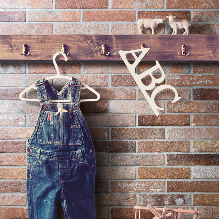 Dettaglio rivestimento in gres porcellanato effetto mattoncino opaco 6x25 cm della collezione Bristol, colore Red di Ceramica Rondine