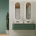 Bagno con mobiletto verde e doppio lavabo, rivestimento bagno in gres porcellanato effetto floreale della collezione Brio di Ceramica Rondine, formato 33,3x100 cm, colore Pastello