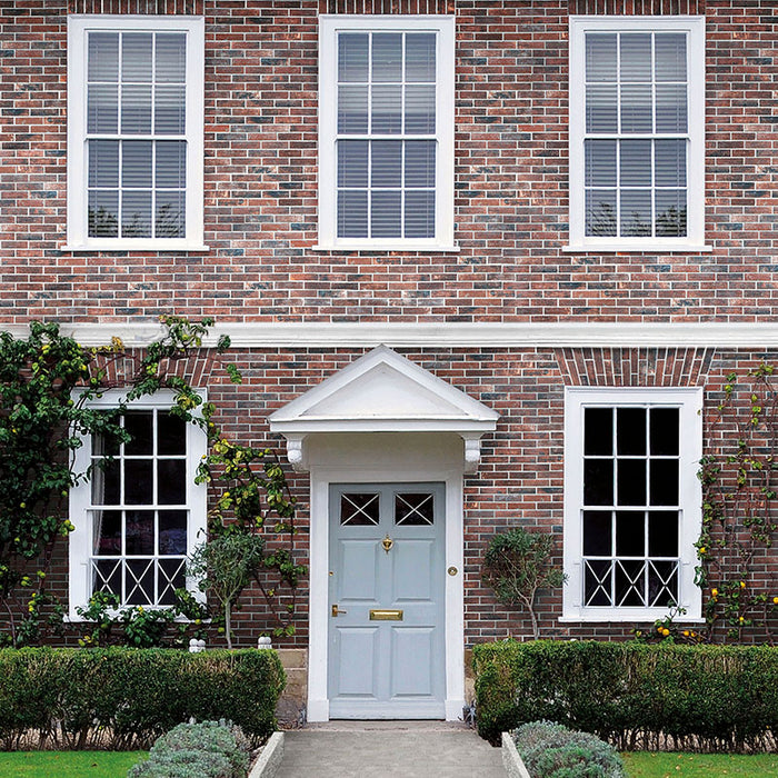 Villa con rivestimento esterno in gres porcellanato effetto mattoncino opaco 6x25 cm della collezione Bristol, colore Umber di Ceramica Rondine