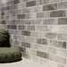 Dettaglio piastrella per pavimento e rivestimento in gres porcellanato effetto mattoncino opaco 6x25 cm della collezione Recovery Stone, colore Grey di Ceramica Rondine
