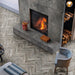 Salotto moderno con camino e pavimento in gres porcellanato effetto legno rustico della collezione Living di Ceramica Rondine, formato 7.5x45 cm, colore Tortora