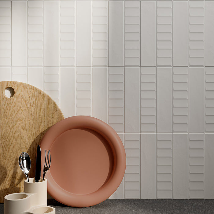 Dettaglio piastrella per rivestimento in gres porcellanato effetto mattoncino Opaco 6x25 cm della collezione Volume, colore White di Ceramica Rondine