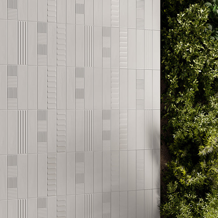 Dettaglio piastrella per rivestimento in gres porcellanato effetto mattoncino Opaco 6x25 cm della collezione Volume, colore Bamboo White di Ceramica Rondine