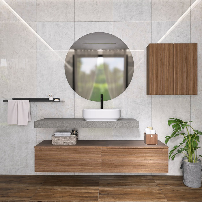 La composizione bagno Penelope 01 si incentra sul top scatolare effetto resina che ospita un lavabo da appoggio bianco. Il pratico pensile a muro e i cassettoni sottostanti offrono massima capienza. Chiude la composizione un grande specchio tondo.