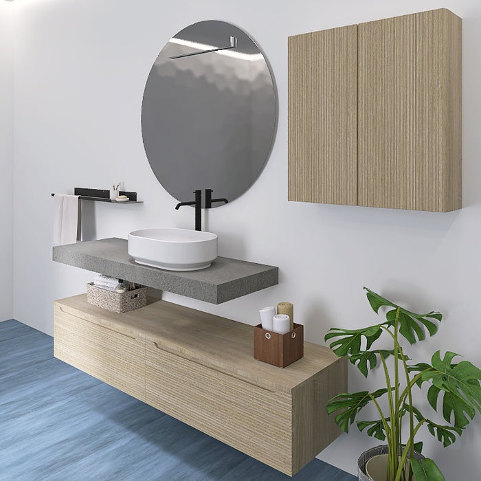 La composizione bagno Penelope 01 si incentra sul top scatolare effetto resina che ospita un lavabo da appoggio bianco. Il pratico pensile a muro e i cassettoni sottostanti offrono massima capienza. Chiude la composizione un grande specchio tondo.