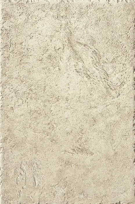 Dettaglio piastrella in gres porcellanato effetto pietra naturale anticata e vissuta, collezione Azteca di Settecento Ceramica, colore Avorio 32,7x49