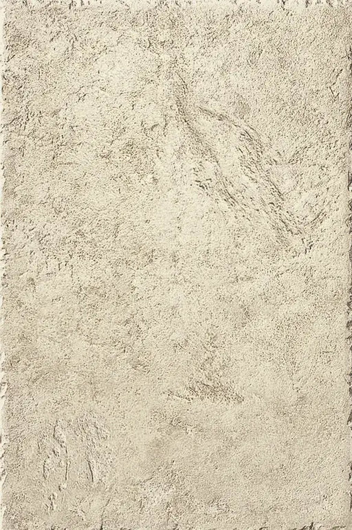 Dettaglio piastrella in gres porcellanato effetto pietra naturale anticata e vissuta, collezione Azteca di Settecento Ceramica, colore Avorio 32,7x49