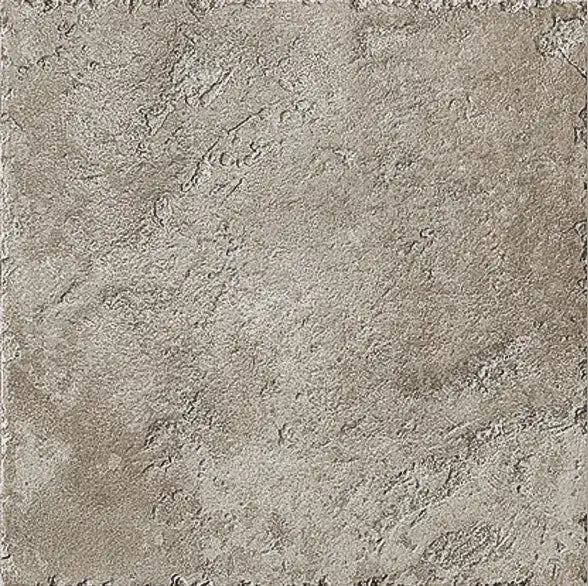 Dettaglio piastrella in gres porcellanato effetto pietra naturale anticata e vissuta, collezione Azteca di Settecento Ceramica, colore Bruno 32,7x32,7