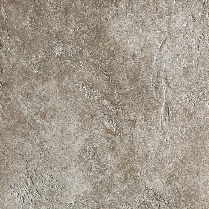 Dettaglio piastrella in gres porcellanato effetto pietra naturale anticata e vissuta, collezione Azteca di Settecento Ceramica, colore Bruno  49x49