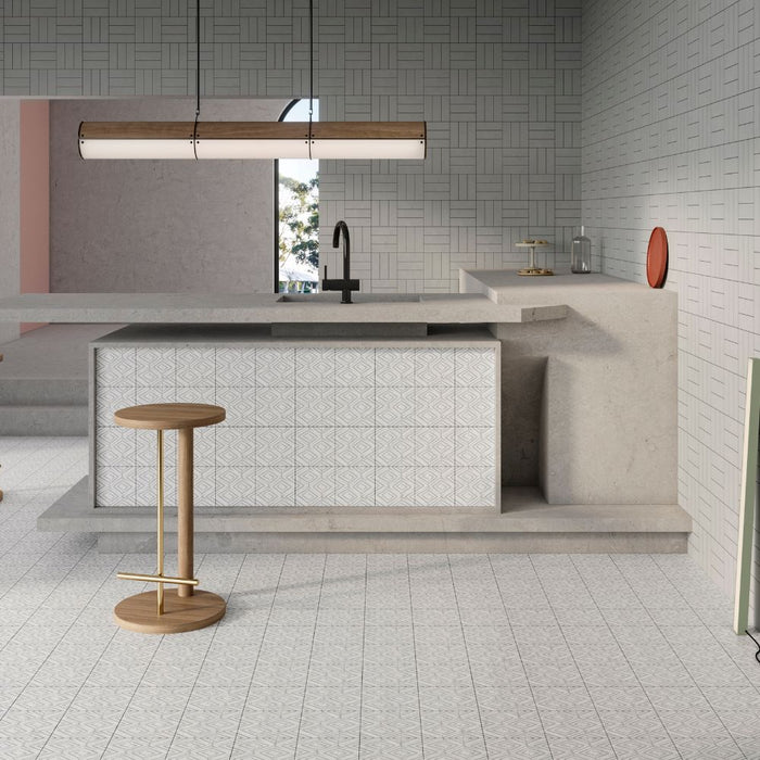 Cucina minimal e moderna con lavello nero, penisola e rivestimento Origini ice 5x15 di self Style by Keradom.