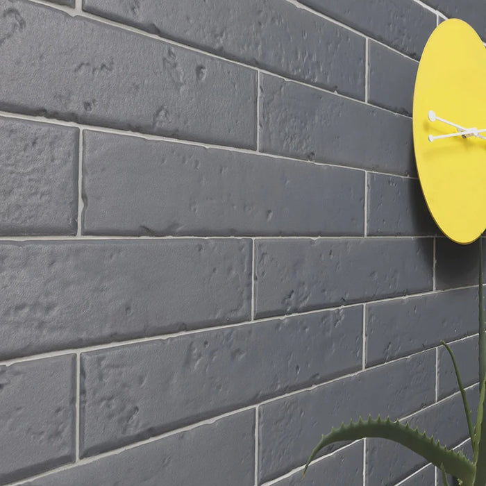 Dettaglio piastrella per rivestimento in gres porcellanato effetto mattoncino rustico opaco 4,5x23 cm della collezione Antique, colore Blue di Ceramica Settecento