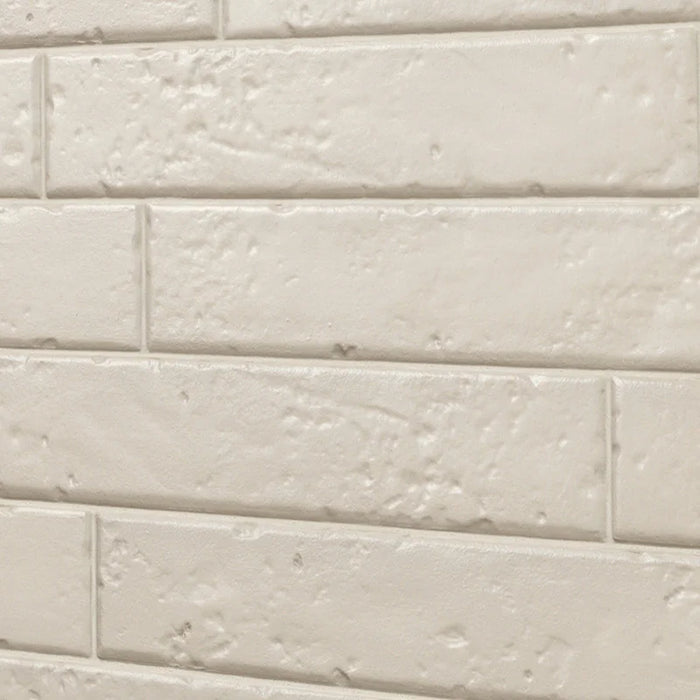 Dettaglio piastrella per rivestimento in gres porcellanato effetto mattoncino rustico opaco 4,5x23 cm della collezione Antique, colore Cotton di Ceramica Settecento