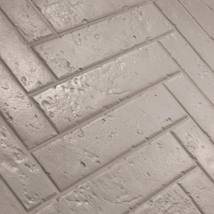 Dettaglio piastrella per rivestimento in gres porcellanato effetto mattoncino rustico opaco 4,5x23 cm della collezione Antique, colore Mud di Ceramica Settecento