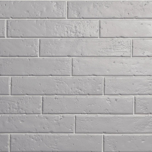 Dettaglio piastrella per rivestimento in gres porcellanato effetto mattoncino rustico opaco 4,5x23 cm della collezione Antique, colore Silver di Ceramica Settecento