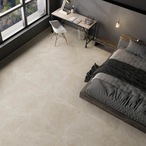 Camera da letto moderna con letto matrimoniale in legno scuro e pavimento in gres porcellanato smaltato opaco effetto pietra naturale ardesia della collezione Ecoslate di Paul & Co Ceramiche, formato 90x90, colore Beige