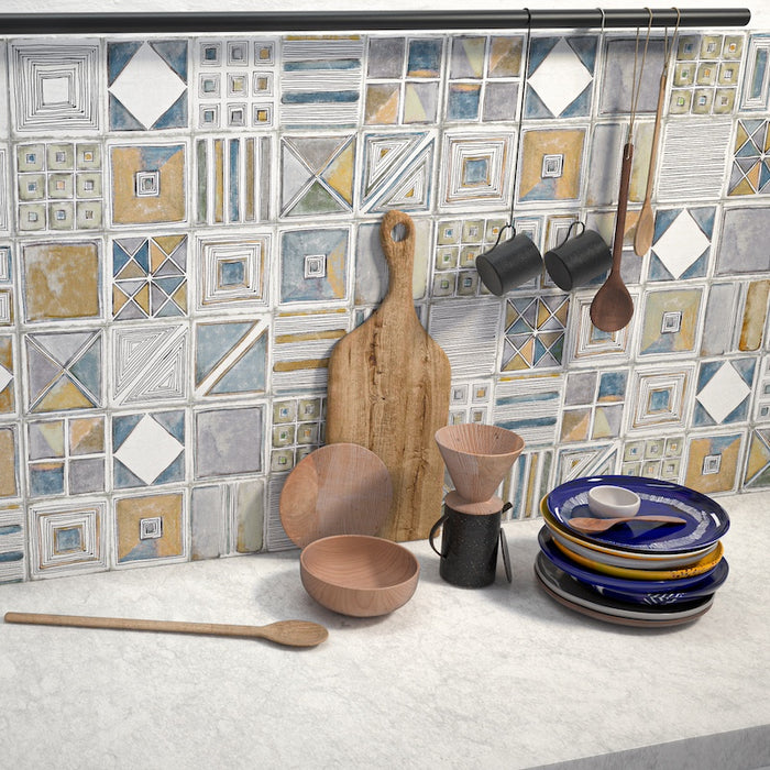 Cucina moderna con rivestimento in bicottura tradizionale multicolor decorato con effetto geometrico della collezione ki match di idea ceramica nel formato 25x60.