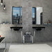 Bagno moderno con doppio lavandino nero e cromato, muro con rivestimento effetto cemento della collezione Madison di Paul & Co Ceramiche, formato 25x60, colore Black