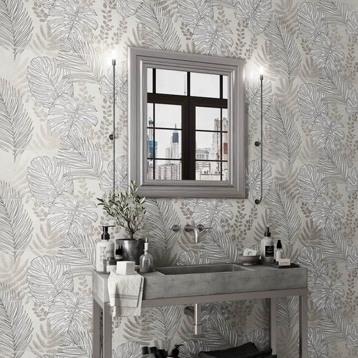 Bagno moderno con lavandino in gres effetto pietra e muro con rivestimento effetto carta da parati con decoro floreale multicolore della collezione More Plus di Paul & Co Ceramiche, formato 25x75 rettificato, colore Frozen Leaves Ice