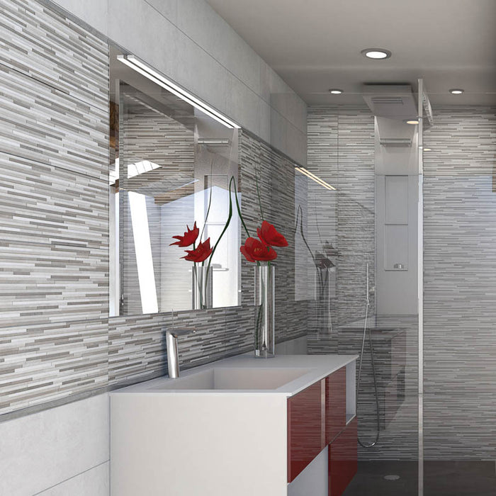 Bagno con mobile sospeso bianco e rosso, muro con rivestimento effetto muretto della collezione Soho di Paul & Co Ceramiche, formato 20x50, colore Brick Grey