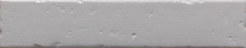 Dettaglio piastrella per rivestimento in gres porcellanato effetto mattoncino rustico opaco 4,5x23 cm della collezione Antique, colore Silver di Ceramica Settecento