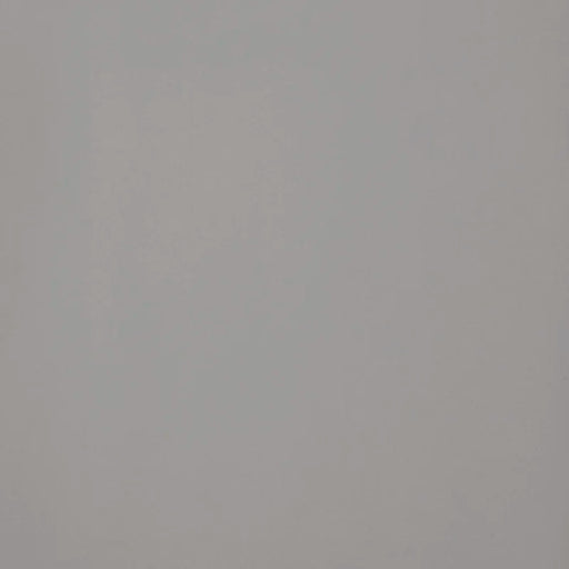 Dettaglio piastrella per pavimento in gres porcellanato effetto resina tinta unita della collezione Architecture di Casalgrande, formato 60x60 rettficato, colore Light Grey