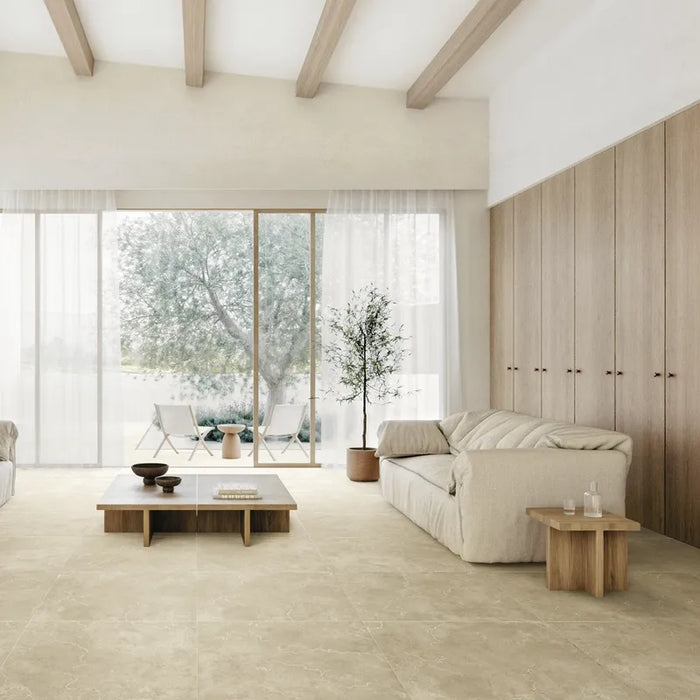 Ambientazione con un salotto contemporaneo con piastrelle in gres porcellanato effetto pietra naturale e vissuta, collezione Attica di Settecento Ceramica, colore Sand 60x120