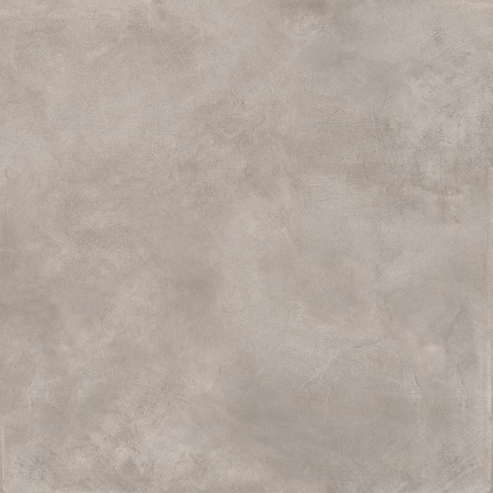 dettaglio piastrella da pavimento e rivestimento in gres porcellanato smaltato opaco effetto cemento nuvolato dai toni caldi della collezione Baya di Paul & Co Ceramiche, formato 90x90, colore Grey
