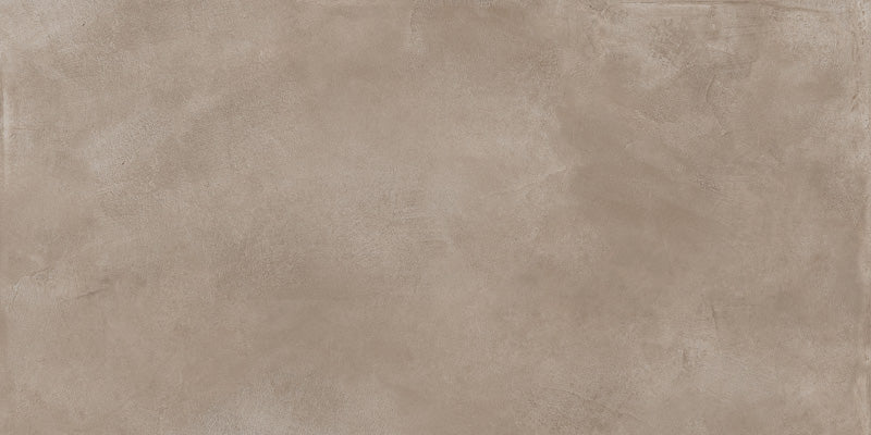 dettaglio piastrella da pavimento e rivestimento in gres porcellanato smaltato opaco effetto cemento nuvolato dai toni caldi della collezione Baya di Paul & Co Ceramiche, formato 30x60, colore Taupe