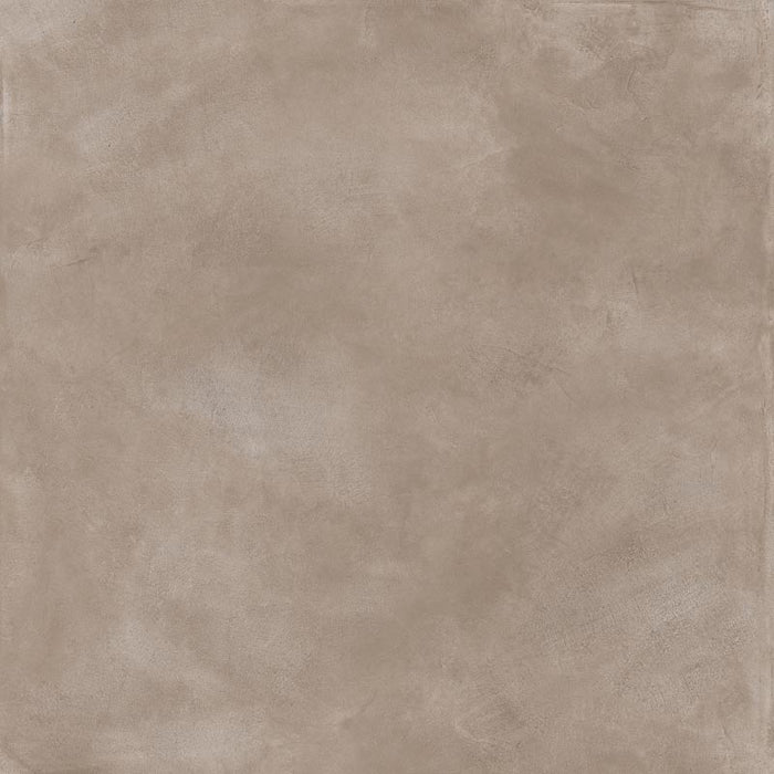 dettaglio piastrella da pavimento e rivestimento in gres porcellanato smaltato opaco effetto cemento nuvolato dai toni caldi della collezione Baya di Paul & Co Ceramiche, formato 90x90, colore Taupe