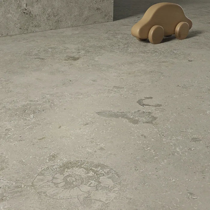 Ambientazione con piastrelle in gres porcellanato effetto pietra naturale e vissuta, collezione Blendstone di Settecento Ceramica, colore Grey 60x60
