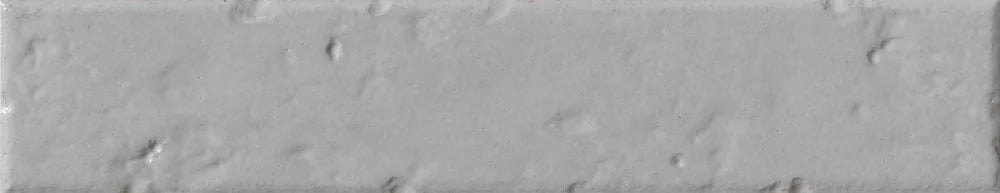 Dettaglio piastrella per rivestimento in gres porcellanato effetto mattoncino rustico Lucido 4,5x23 cm della collezione Brickart, colore Graystone di Ceramica Settecento