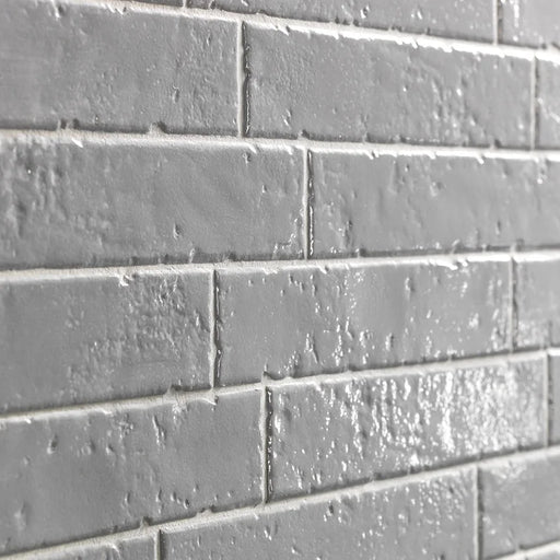 Dettaglio piastrella per rivestimento in gres porcellanato effetto mattoncino rustico Lucido 4,5x23 cm della collezione Brickart, colore Graystone di Ceramica Settecento
