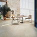 Gazebo esterno con pavimento Colosseum Caramel di Idea Ceramica in gres porcellanato effetto pietra 60x60 cm con bordo irregolare anticato per esterni rustici