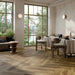 Ristorante moderno con pavimento in gres porcellanato effetto legno rustico della collezione Cortina di Ceramica Rondine, formato 24x120 cm, colore Nut