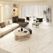 Salotto moderno elegante con pavimento in gres porcellanato effetto marmo opaco, della collezione La Marmoteca di Gardenia Orchidea, formato 120x120 NAT. PTECH, colore Calacatta Elegance
