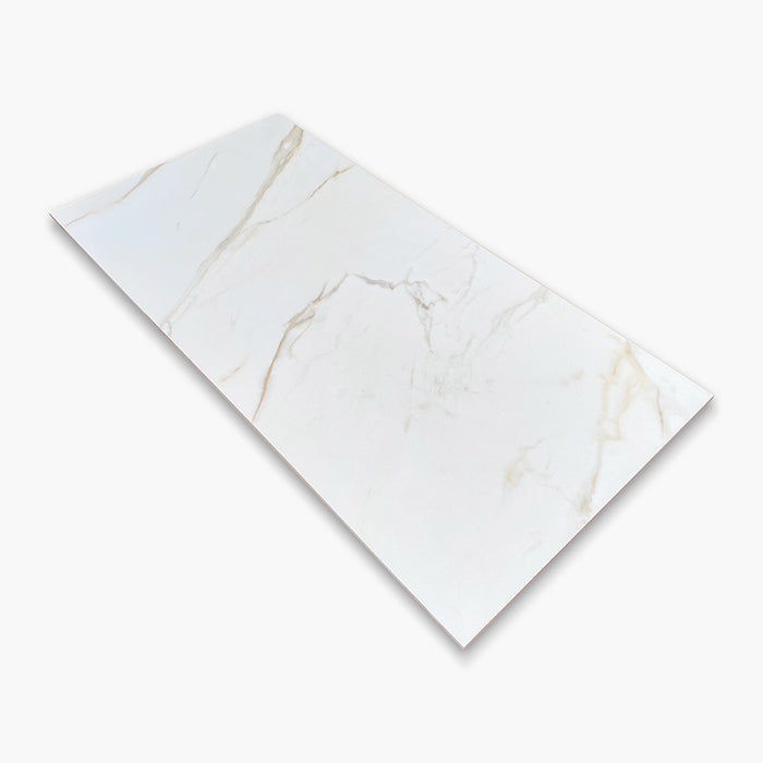 Foto piastrella in gres porcellanato effetto marmo opaco della collezione Canova di Ceramica Rondine, formato 60x120, colore Calacatta Gold