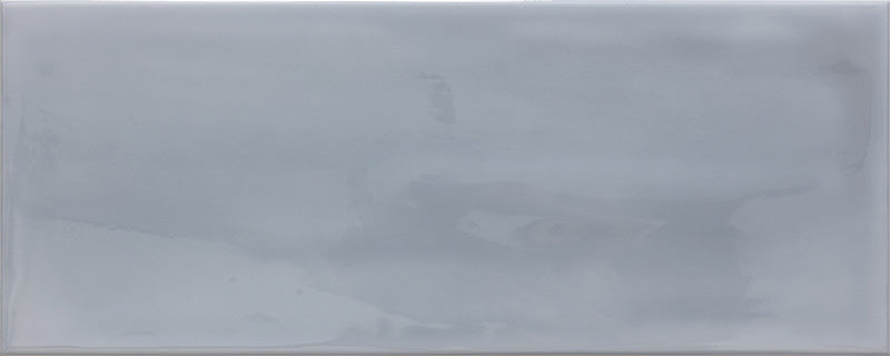 dettaglio piastrella da rivestimento in tinta unita lucida dai colori vivaci della collezione Caribe di Paul & Co Ceramiche, formato 20x50, colore Grey