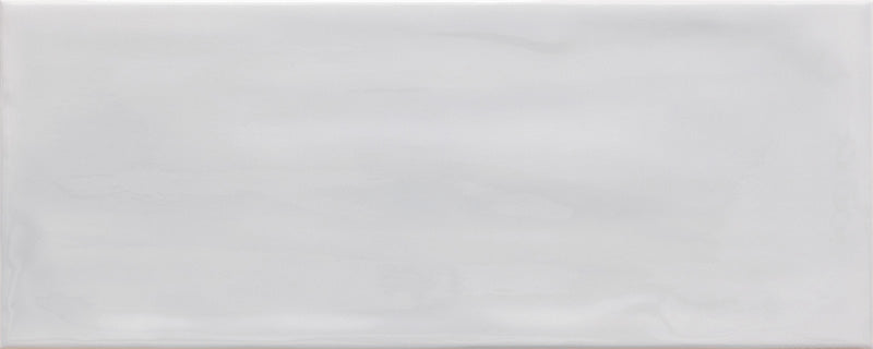 dettaglio piastrella da rivestimento in tinta unita lucida dai colori vivaci della collezione Caribe di Paul & Co Ceramiche, formato 20x50, colore Ice