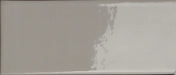 Dettaglio Piastrella da rivestimento in gres serie Cosmo di 41zero42, effetto mattoncino lucido, formato 6x15 cm, Colore Brick Lux Grigio