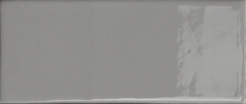 Dettaglio Piastrella da rivestimento in gres serie Cosmo di 41zero42, effetto mattoncino lucido, formato 6x15 cm, Colore Brick Lux Grigio