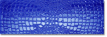 Dettaglio piastrella in gres porcellanato effetto pelle di coccodrillo in rilievo della Collezione Crocotiles di Ceramica Settecento, colore Blue 24x72 cm