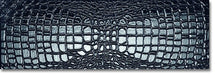 Dettaglio piastrella in gres porcellanato effetto pelle di coccodrillo in rilievo della Collezione Crocotiles di Ceramica Settecento, colore Black 24x72 cm